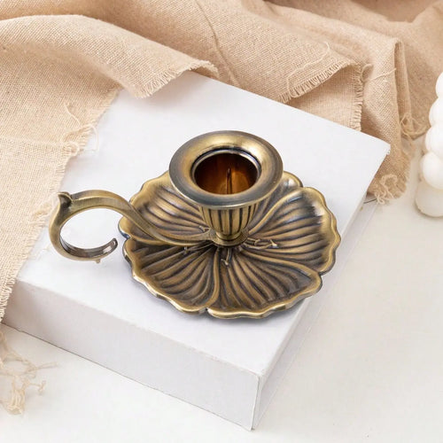 Bougeoir vintage en bronze avec poignée incurvée
