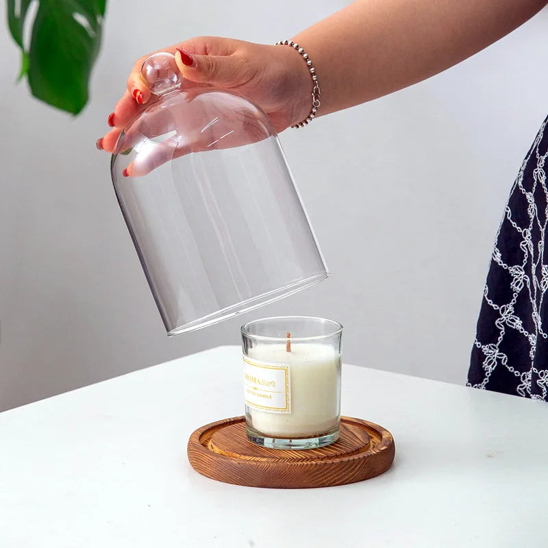 Cloche en verre avec base en bois